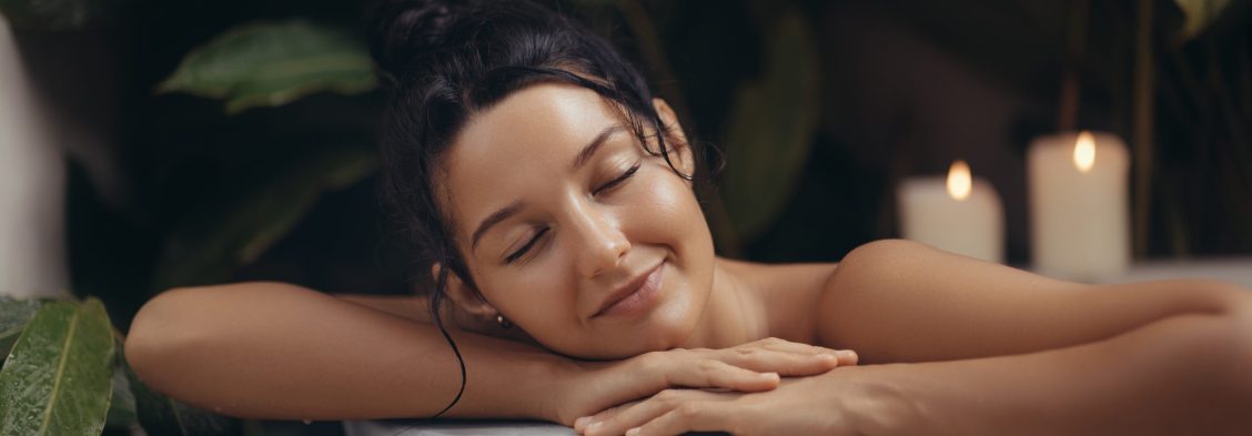 A,Serene,Woman,With,A,Relaxed,Expression,Enjoys,A,Luxurious