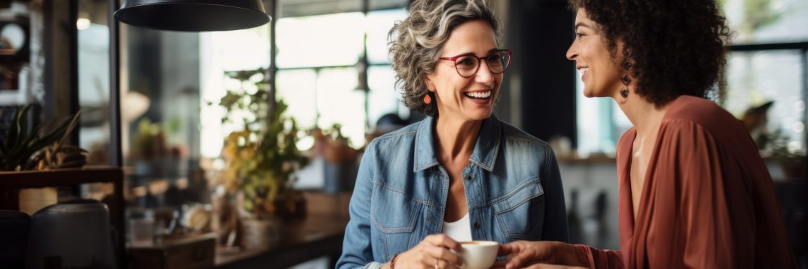 Young and senior. Two women are sitting indoors by the table. Beautiful illustration picture. Generative AI.